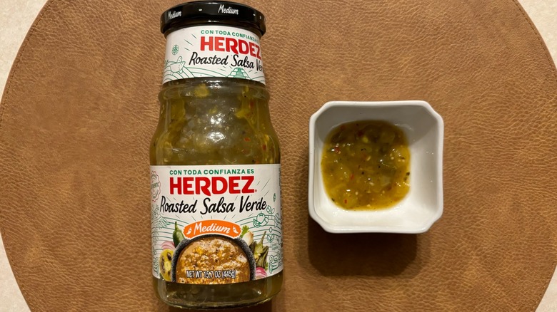 HERDEZ Medium Roasted Salsa Verde jar with salsa in white ramekin