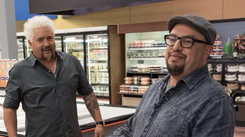 Guy Fieri and Carl Ruiz photographed inside a grocery store while celebrating the latter's birthday.