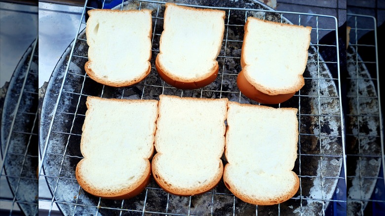 Slices of bread on a grill