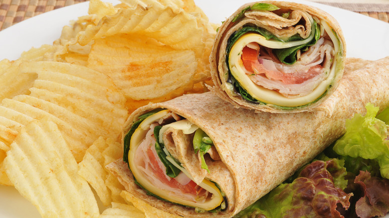 Turkey and cheese wrap with potato chips
