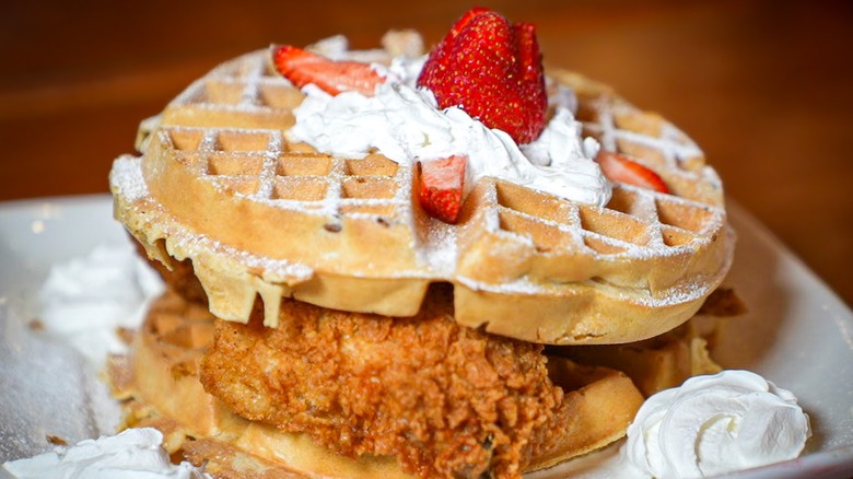 Marietta Diner chicken and Belgian waffle with whipped cream and strawberry