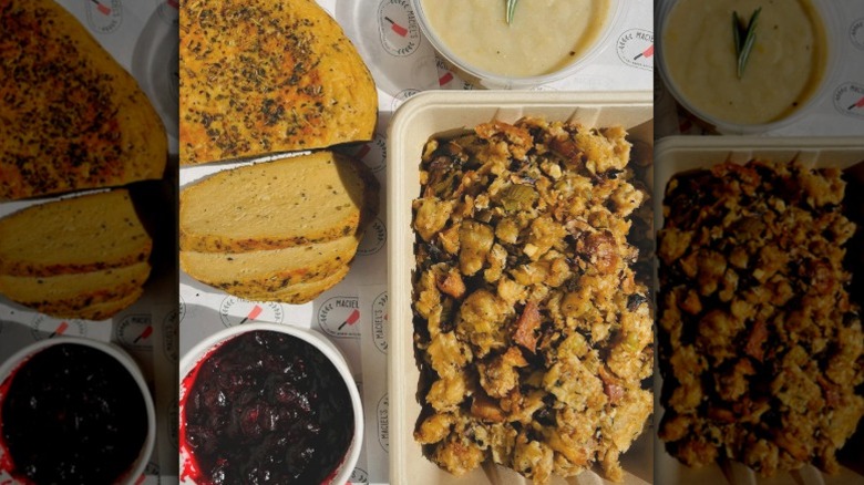 Thanksgiving meal with vegan roast, stuffing, gravy, and cranberry sauce from Maciel's Plant-Based Butcher Shop in Los Angeles, California