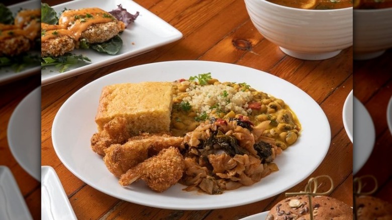 Vegan chicken, cornbread, beans, and other dishes from I-Tal Garden in New Orleans, Louisiana