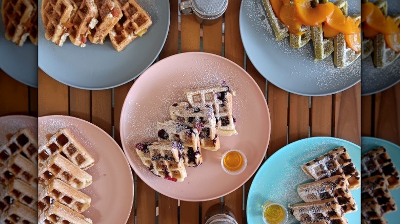 Cegan waffles with fruit, powdered sugar, and syrup from The Squeeze Juice Bar and Vegan Eatery in Vicksburg, Mississippi