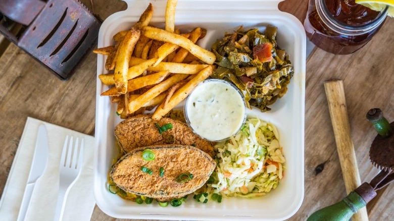 Vegan fried fish, coleslaw, fries, and collard greens from Pure Soul in Durham, North Carolina