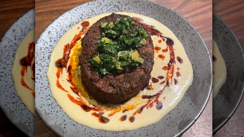 Vegan tempeh Mozambique on bed of sauce from Foglia in Bristol, Rhode Island