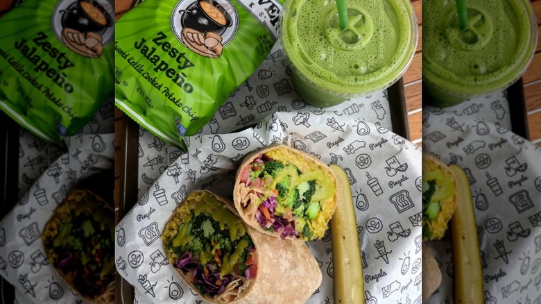 Vegan wrap with jalapeño chips, pickle, and green juice from Pingala Café in Vermont