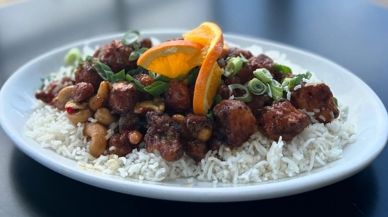 Vegan mandarin orange cauliflower over white rice with orange peel garnish from Sweet Melissa Cafe in Laramie, Wyoming