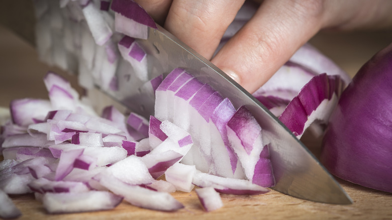 Chopping red onions
