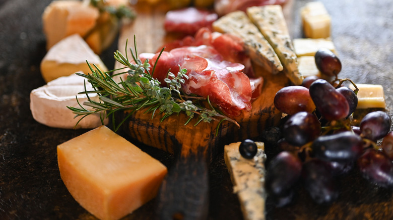 Close-up of cheese on a charcuterie platter