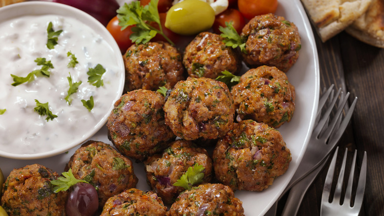 Lamb meatballs on a plate with sauce