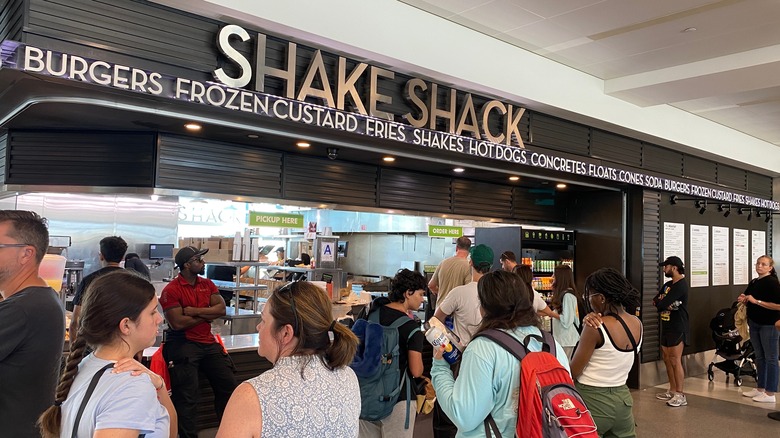 Customers lined up at the Shake Shack inside JFK International Airport, one of the few locations that offers breakfast.