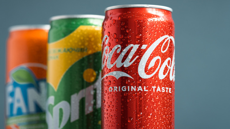 cans of Coca-Cola sodas