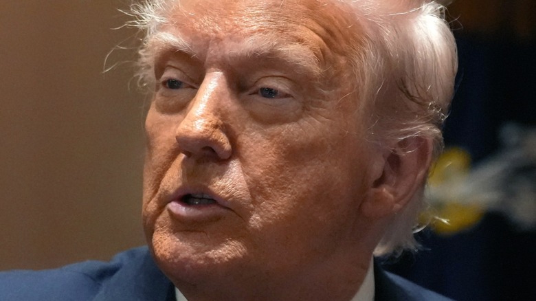 Donald Trump wearing a blue suit