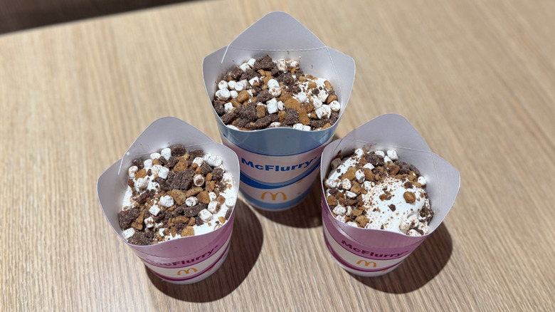 Three McDonald's S'mores McFlurry treats on a table