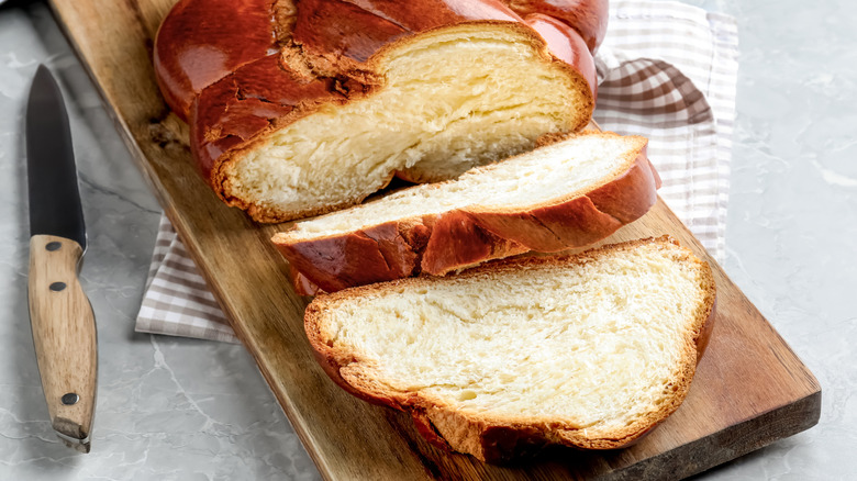 Challah, a low-hydration bread, on a cutting board