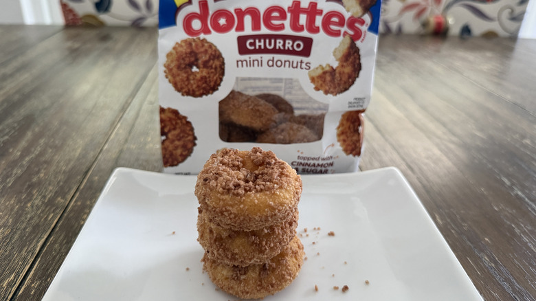 Hostess Churro Donettes on white plate with box in background