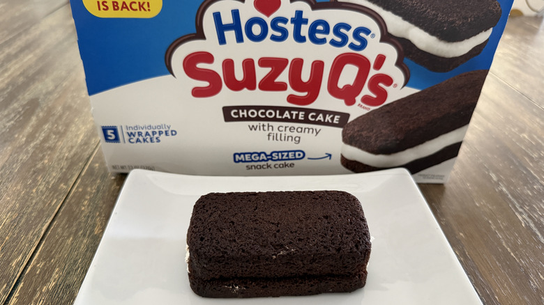 Hostess Suzy Q's on white plate with box in background