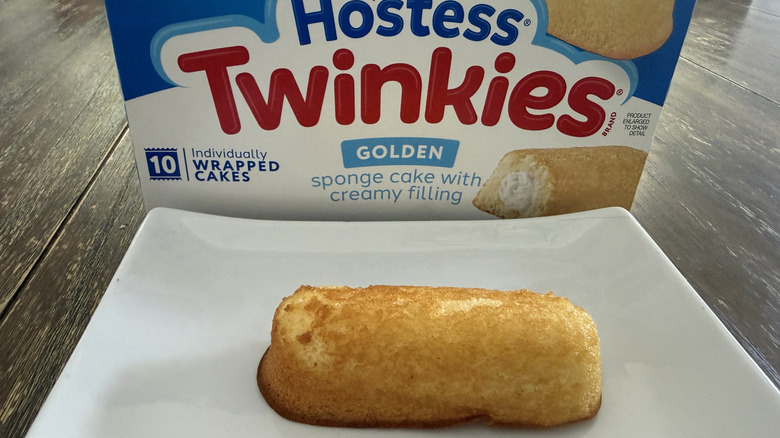 Hostess Twinkie on white plate with box in background