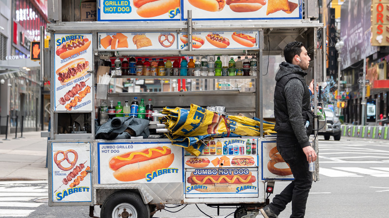 Man by Sabrett hot dog cart in New York City