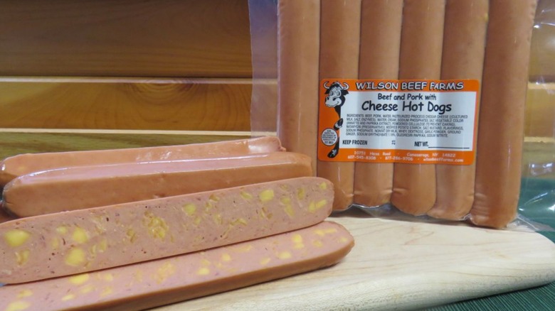 Packages of Wilson cheese hot dogs