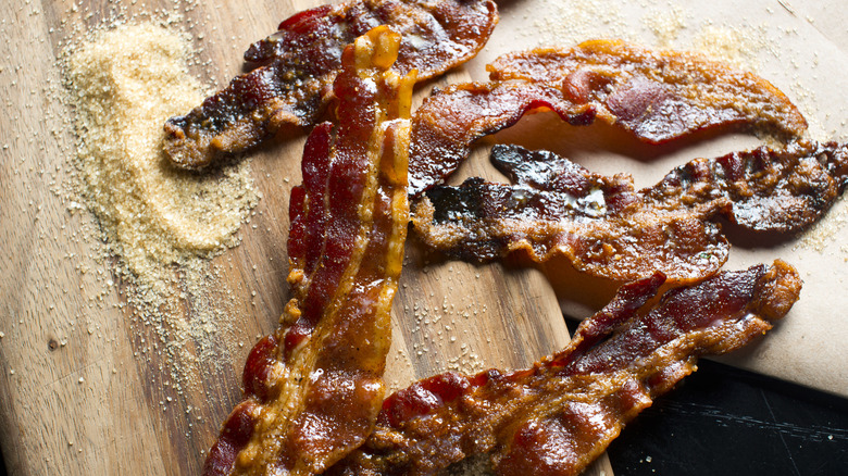 A closeup of pieces of sweetened glazed bacon