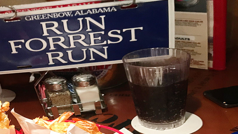 "Run Forrest Run" license plate-style restaurant sign