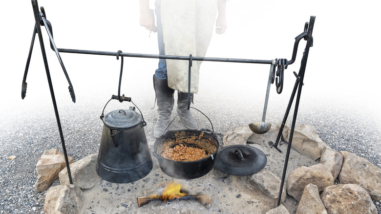 Old West-style cooking over a fire