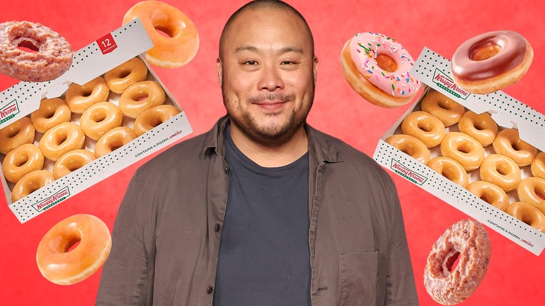 David Chang with Krispy Kreme donuts and boxes around him.