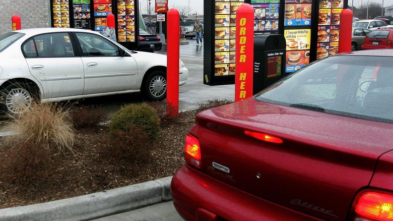 cars in a McDonald's drive-thru