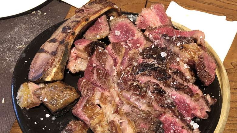 Rare T-bone steak on a plate