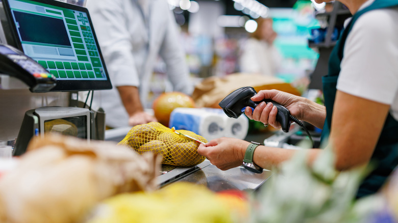 Items being scanned at grocery checkout