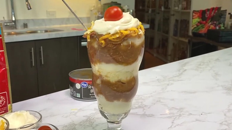 A hot beef sundae sitting on a counter.