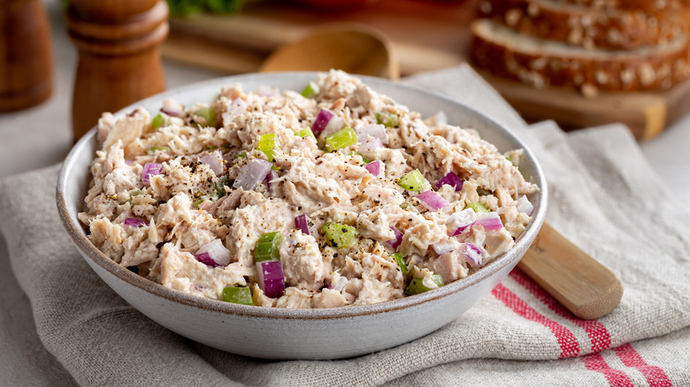 Tuna salad with red onion and celery in a bowl