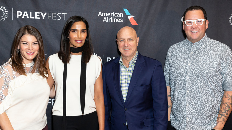 Judges of TV series "Top Chef" posing for photograph