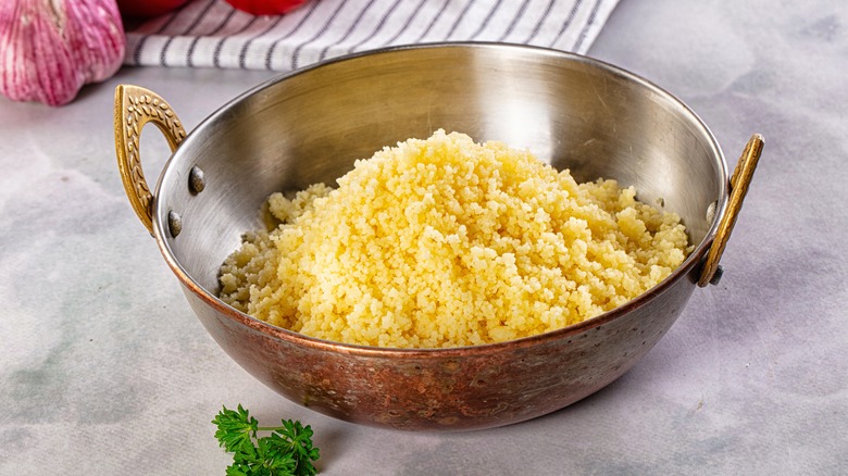 Plain couscous in traditional North African bowl
