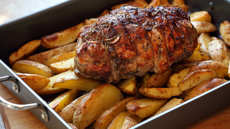 Lamb roast over potato wedges