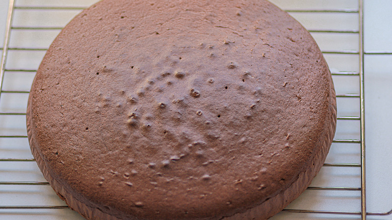 cake cooling on a wire rack