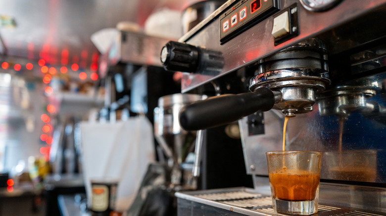 A shot of espresso being prepared