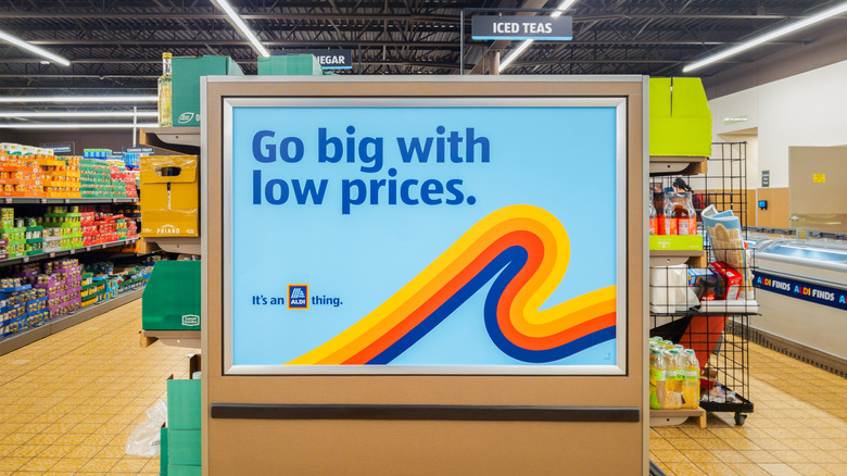 A promotional Aldi sign for low prices