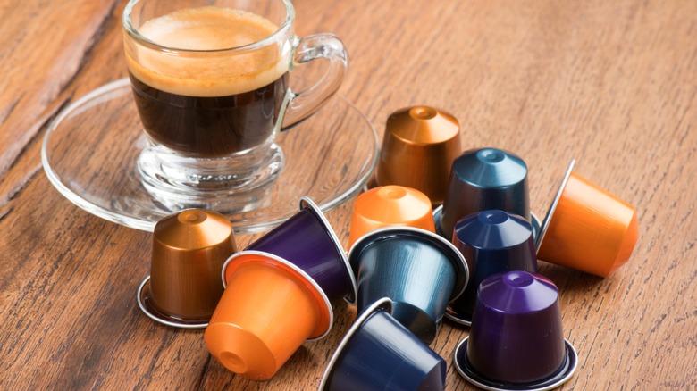 Nespresso pods and mug of coffee