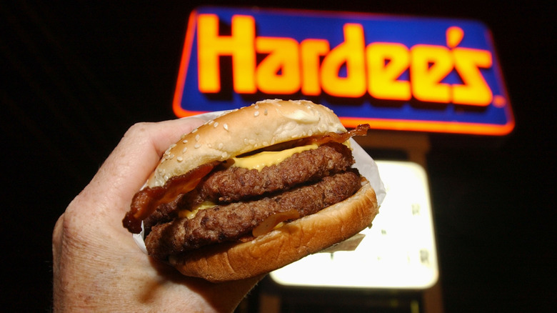 A close-up of a Hardee's "Monster" double cheeseburger