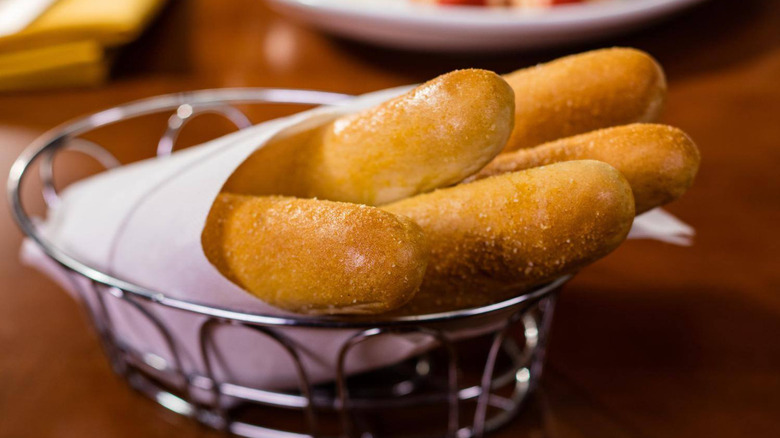 A bowl of Olive Garden breadsticks