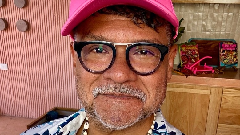 Chef Rick Martinez in a pink hat.