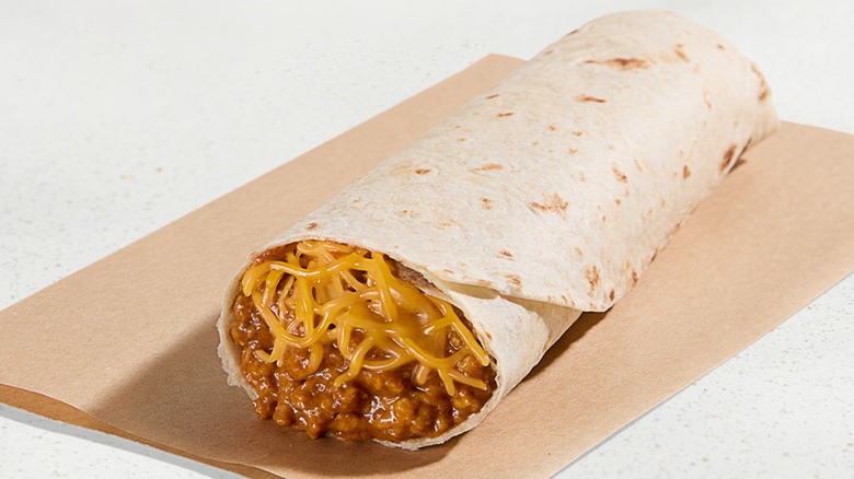 A Taco Bell chili cheese burrito on paper