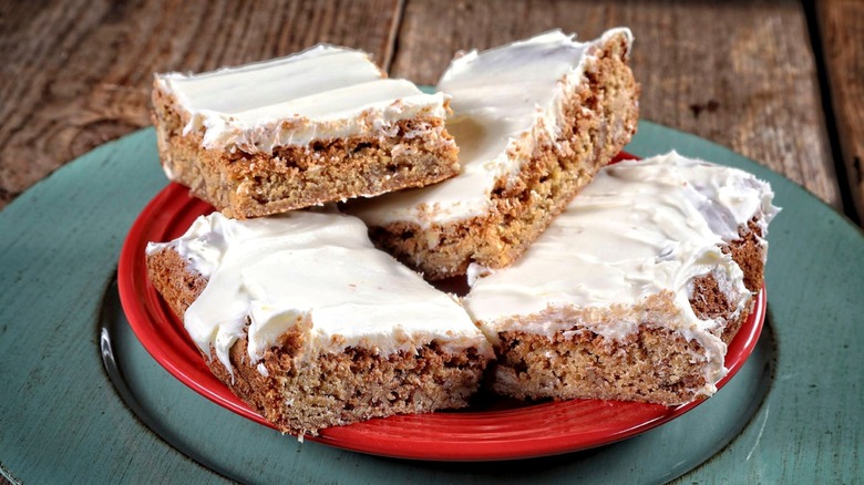 Frosted sad cake on blue plate