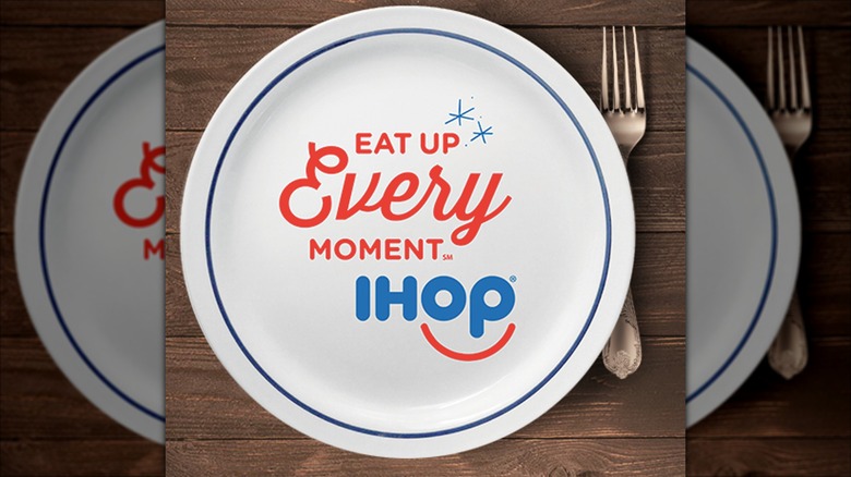 An IHOP plate with the slogan "Eat Up Every Moment"
