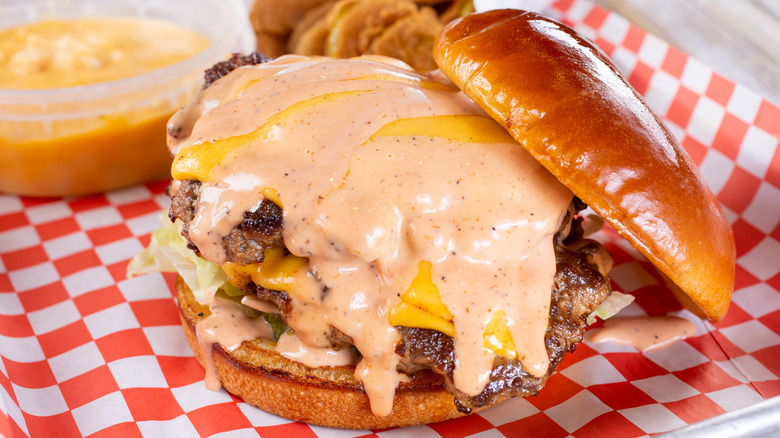 Hamburger covered in Thousand Island dressing