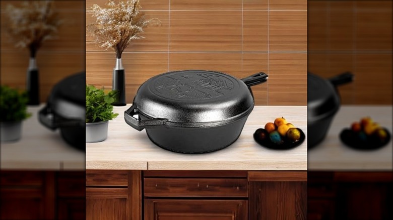 Cast iron combo cooker on a kitchen counter