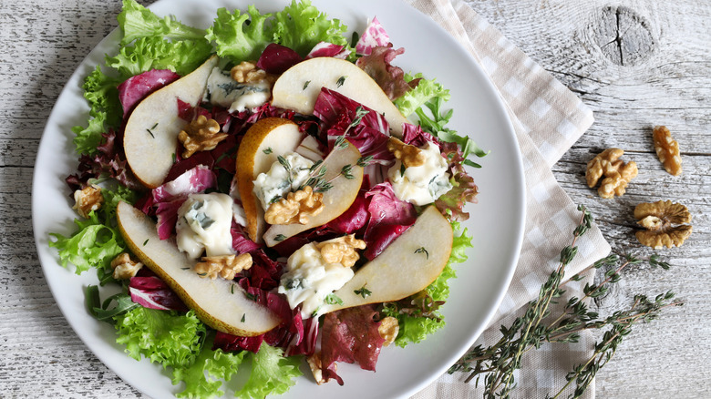 Radicchio salad with fresh pears, blue cheese, walnuts, and thyme